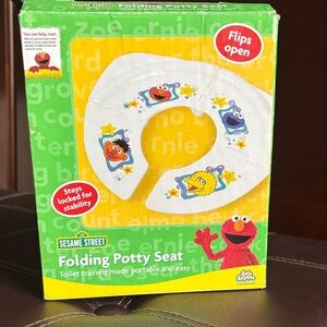 BNIB Sesame Street Folding Potty Seat - White with Colorful Characters